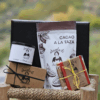 Abuela Ili handmade chocolate products in a Christmas gift set with a mountain background in the Alpujarra.