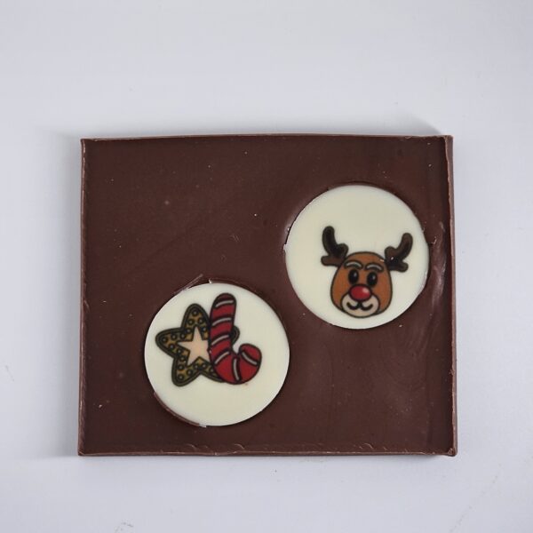 Tableta de chocolate negro artesanal de Abuela Ili con medallón navideño “Felices Fiestas”.